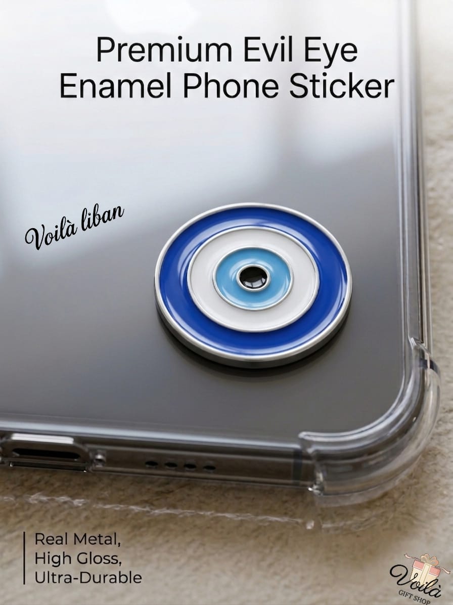 Premium round blue metal enamel phone sticker designed as a traditional evil eye (Nazar) with concentric circles of dark blue, white, light blue, and a black center, attached to a clear phone case.