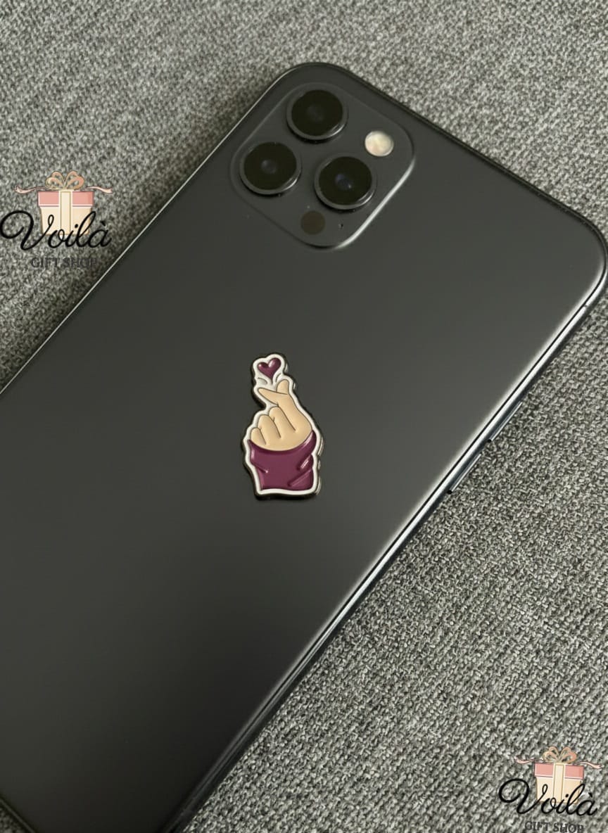 Phone case with a unique design on a gray surface
