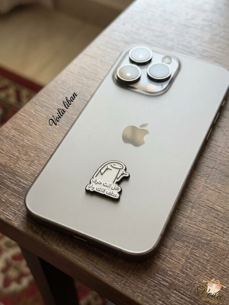 Phone case with Apple logo and text on a wooden surface