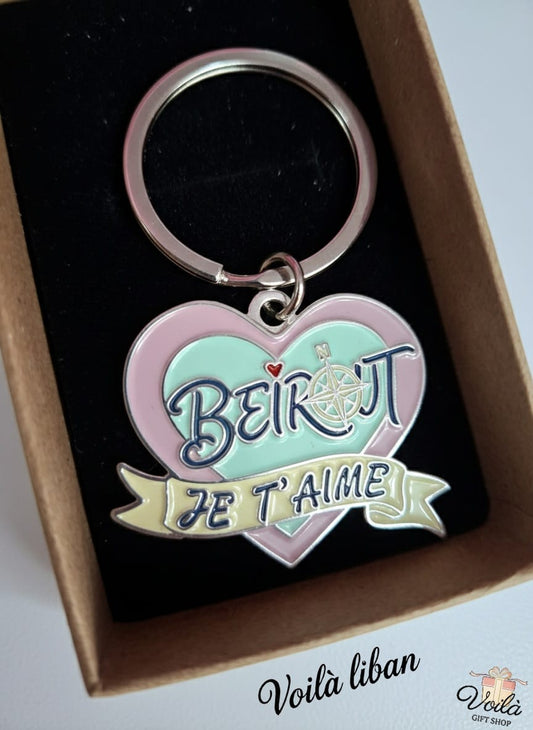 Heart-shaped keychain with 'Beirut Je T'Aime' text in a box, featuring the brand 'Voila Liban'.