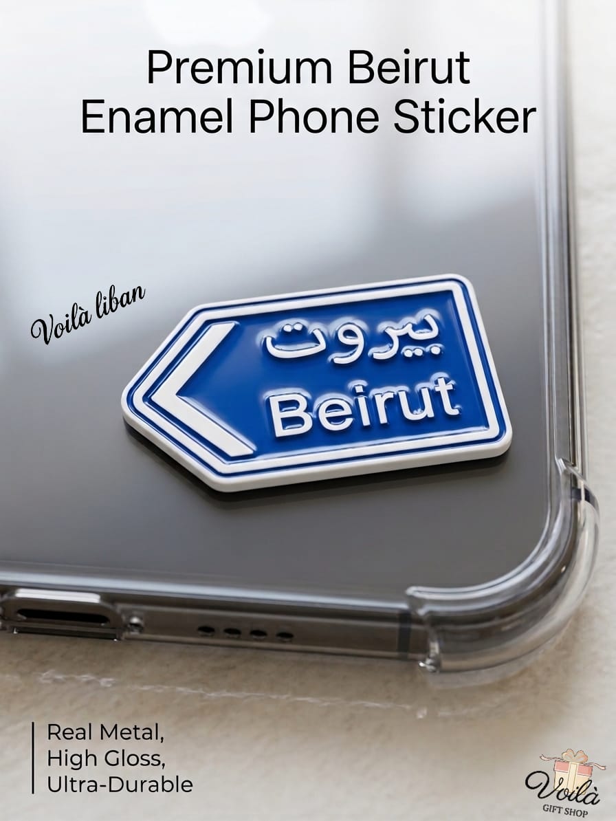 Premium blue metal enamel phone sticker shaped like a Lebanese street sign pointing left, featuring the word "Beirut" in both Arabic script (بيروت) and English, affixed to the back of a clear smartphone case.