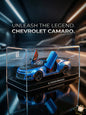 Blue Chevrolet Camaro model car in a clear display case with 'Unleash the Legend Chevrolet Camaro' text.