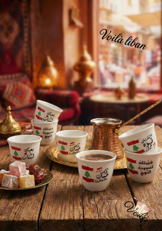 Cups with Middle Eastern design on a wooden table with traditional decor