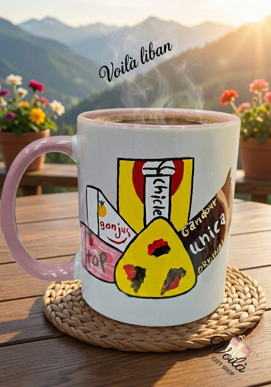 Mug with colorful designs and text on a wooden table with a mountainous background