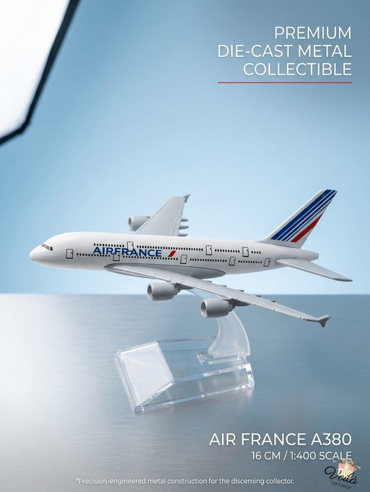 Model of an Air France A380 airplane on a reflective surface with a clear blue background.
