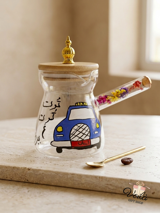 Hand-painted glass rakweh featuring a blue Lebanese taxi and dried flower handle