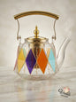 Luxury stained glass teapot with gold handle and colorful diamond patterns for Lebanese tea time