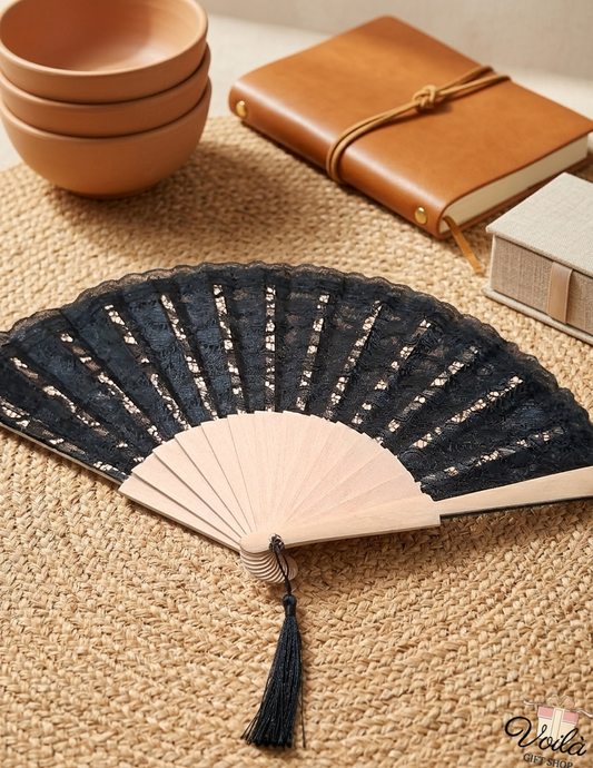 Elegant black lace hand fan with wooden ribs and black tassel
