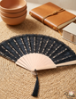 Elegant black lace hand fan with wooden ribs and black tassel