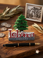 Handcrafted Cedar of Lebanon desk ornament with olive leaves and coins