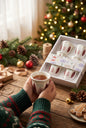 Set of 6 ceramic tea and coffee cups in a gift box on a festive Christmas table