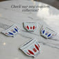 Decorative coasters with floral patterns on a marble surface, with text 'Check our new coasters collection!'.