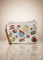 Pouch with colorful illustrations on a beige background