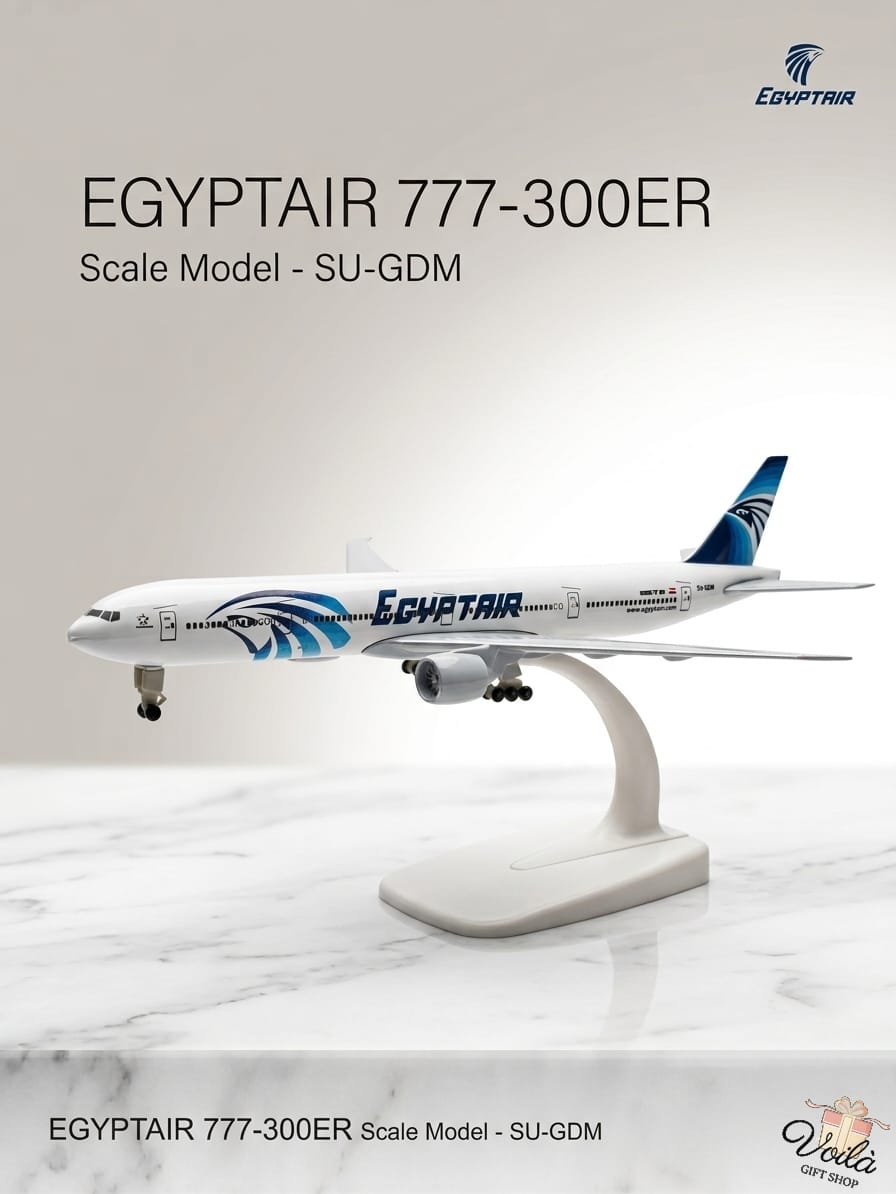 Model of an EgyptAir 777-300ER airplane on a white background