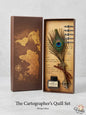 Cartographer's Quill Set with peacock feather, ink bottle, and quill in decorative box on light gray background