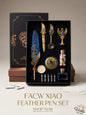 Facw Xiao feather pen set with decorative items in a black box on a beige background