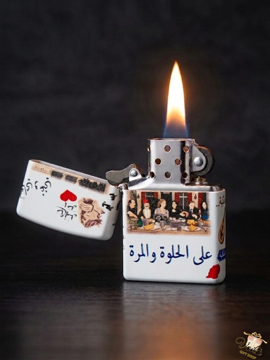 Lighter with a design of a scene and Arabic text, lit on a dark background