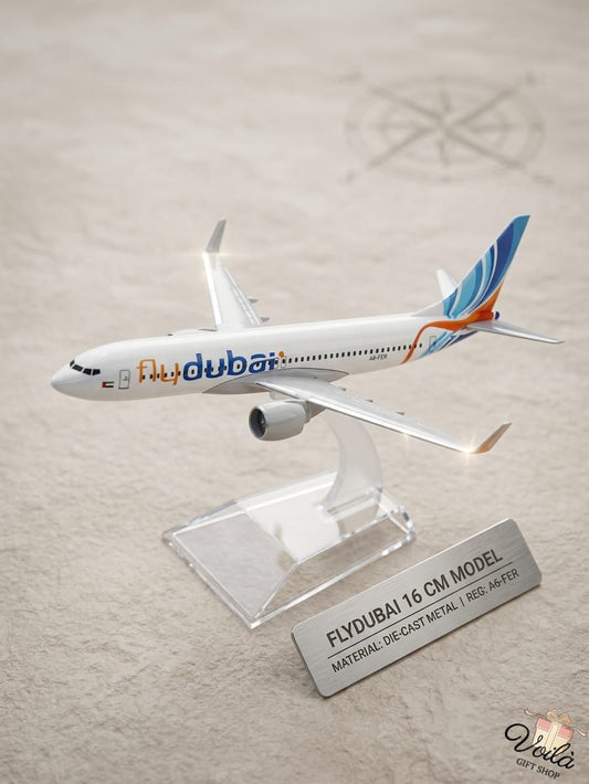 Model airplane with Flydubai branding on a light gray background