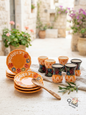 Hand-painted orange and black Lebanese ceramic coffee set with saucers and olive wood spoon