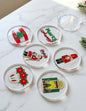 Set of 6 clear acrylic Christmas coasters with Lebanese holiday designs and clear holder