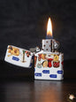 Lighter with decorative design and lit flame on a dark background