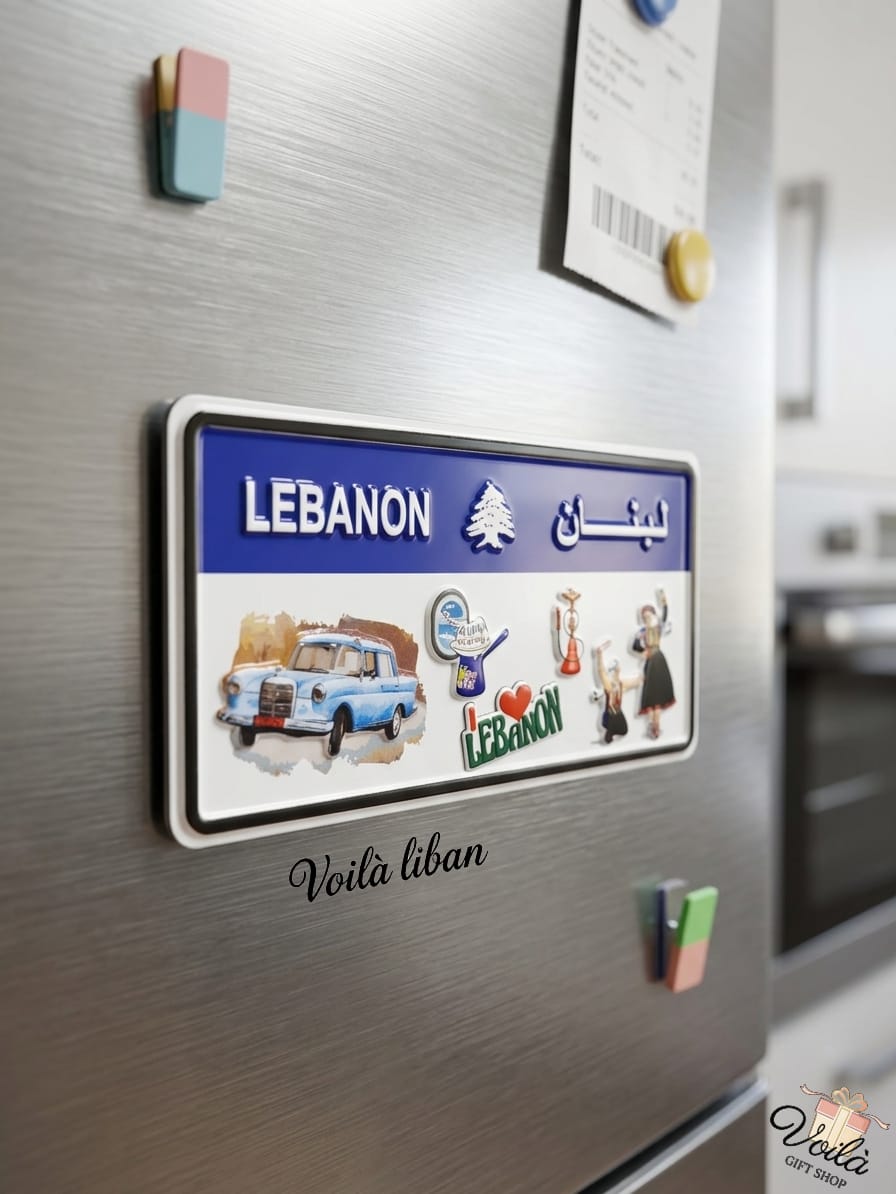 Decorative Lebanese license plate fridge magnet featuring cultural icons including a vintage blue service taxi, traditional Dabke dancers, a coffee rakwe, and a hookah.