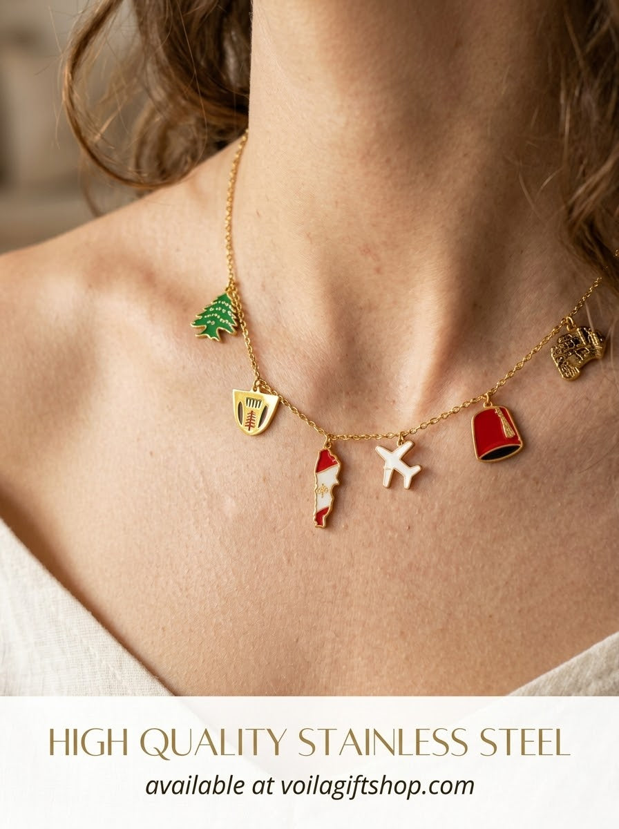 Gold-plated Lebanese heritage charm necklace featuring cedar tree and map charms