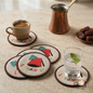 Set of hand-embroidered Lebanese coasters featuring a Tarboush and Cedar tree next to a cup of Lebanese coffee