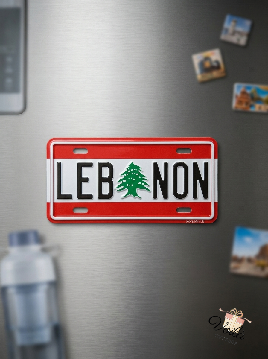 Lebanon license plate fridge magnet featuring the green cedar tree on a stainless steel refrigerator