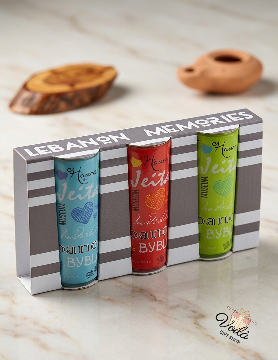 Three colorful Lebanon Memories souvenir tins featuring iconic Lebanese landmarks