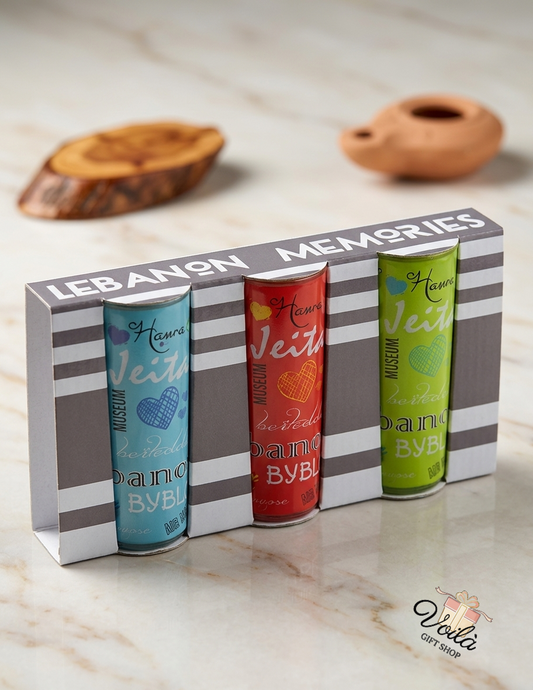 Three colorful Lebanon Memories souvenir tins featuring iconic Lebanese landmarks