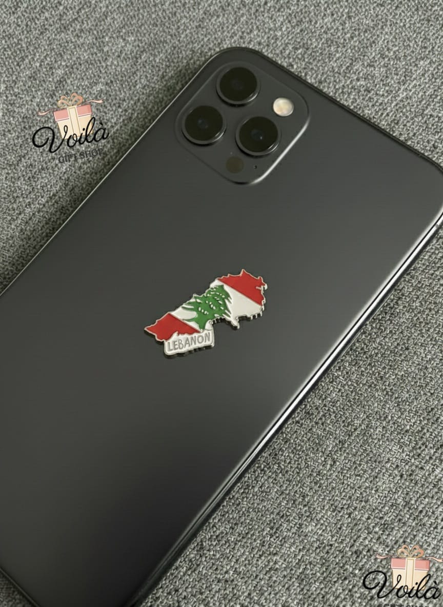 Phone case with a Lebanon map and flag design on a textured surface