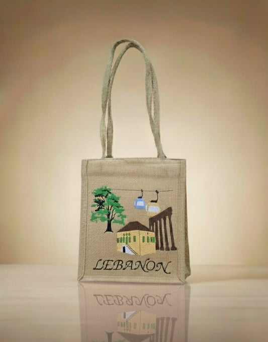 Jute bag with embroidered design and 'Lebanon' text on a beige background