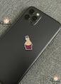 Phone case with a unique design on a gray surface