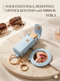 Voila pastel blue vegan leather lipstick keychain holder with integrated mirror on a marble tray