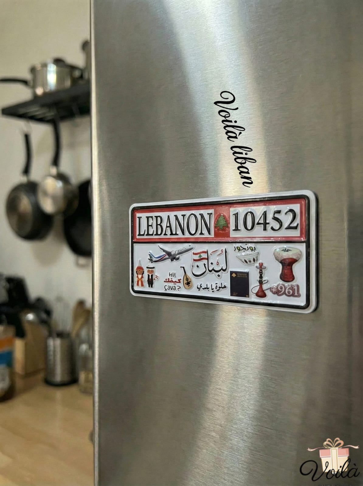 Sticker on a refrigerator door with 'Lebanon' and '10452' text