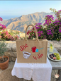 Handcrafted Lebanese embroidered jute tote bag with traditional motifs