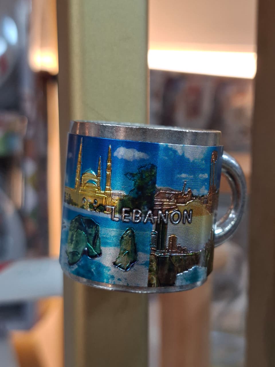 Mug with a scenic design of Lebanon on a blurred background