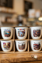 Set of six traditional Lebanese coffee cups with nostalgic illustrations and phrases