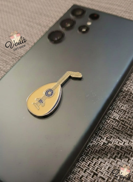 Phone case with a lute-shaped design on a textured surface