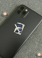 Phone case with passport and airplane design on a gray surface