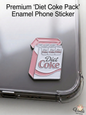 Premium pink Diet Coke enamel phone sticker on a clear phone case
