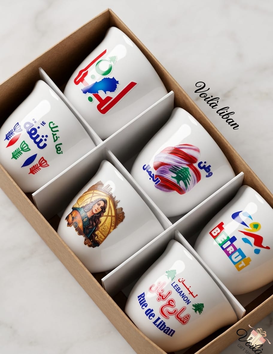 Set of six premium white ceramic Arabic coffee cups featuring vintage Beirut themes, retro colorful typography, and classical Lebanese portrait art, presented in a kraft display box.