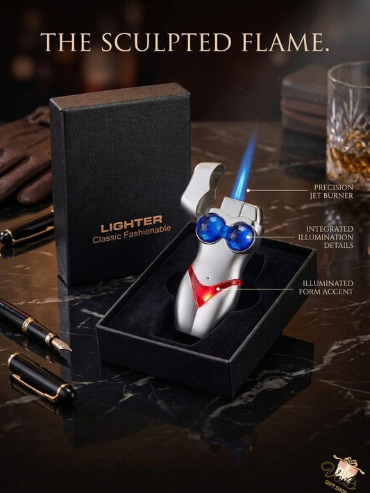 Lighter with illuminated design in a black box on a dark surface