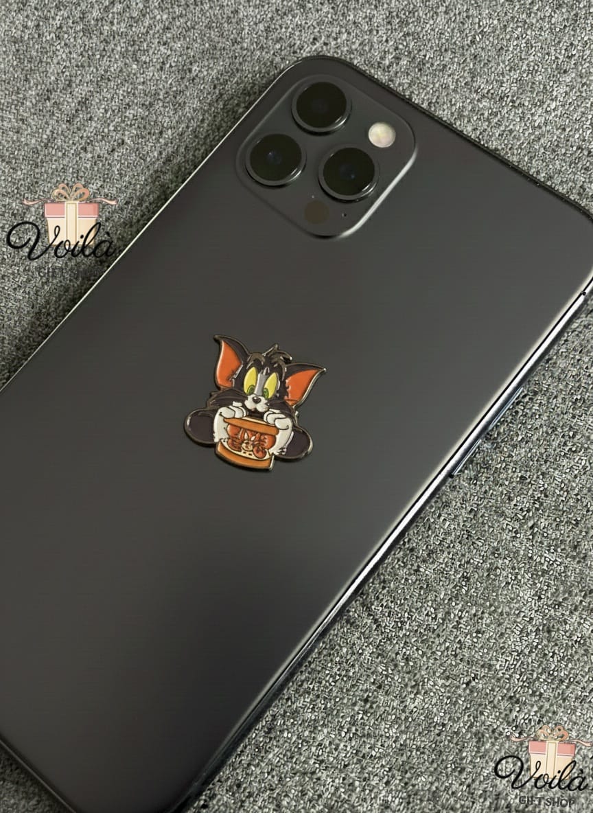 Phone case with cartoon character design on a textured surface