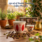 Traditional Lebanese 150ml coffee cup with red patterns on a sunny balcony
