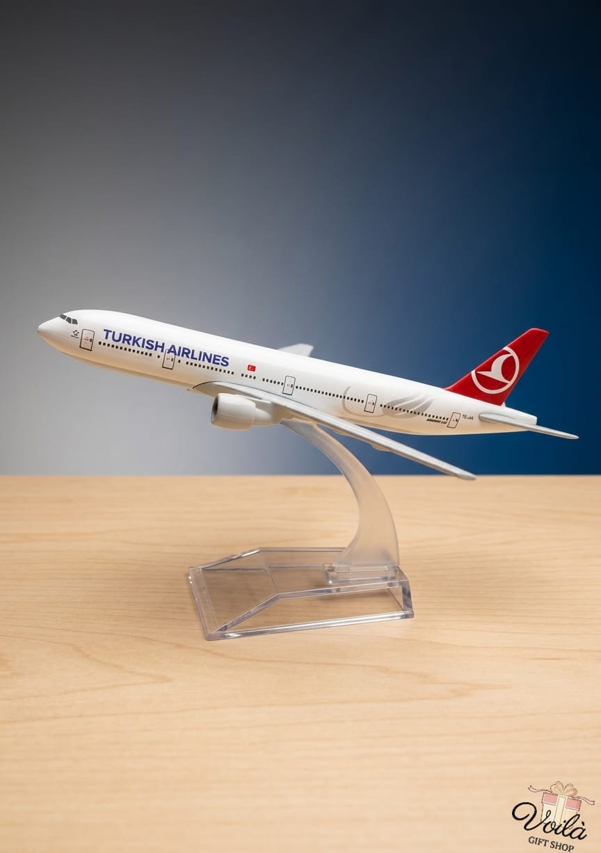 Model airplane of Turkish Airlines on a stand with a gradient background