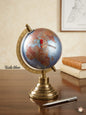 Antique-style decorative globe featuring a magnifier focused on Lebanon, resting on a heavy brass and copper stand.