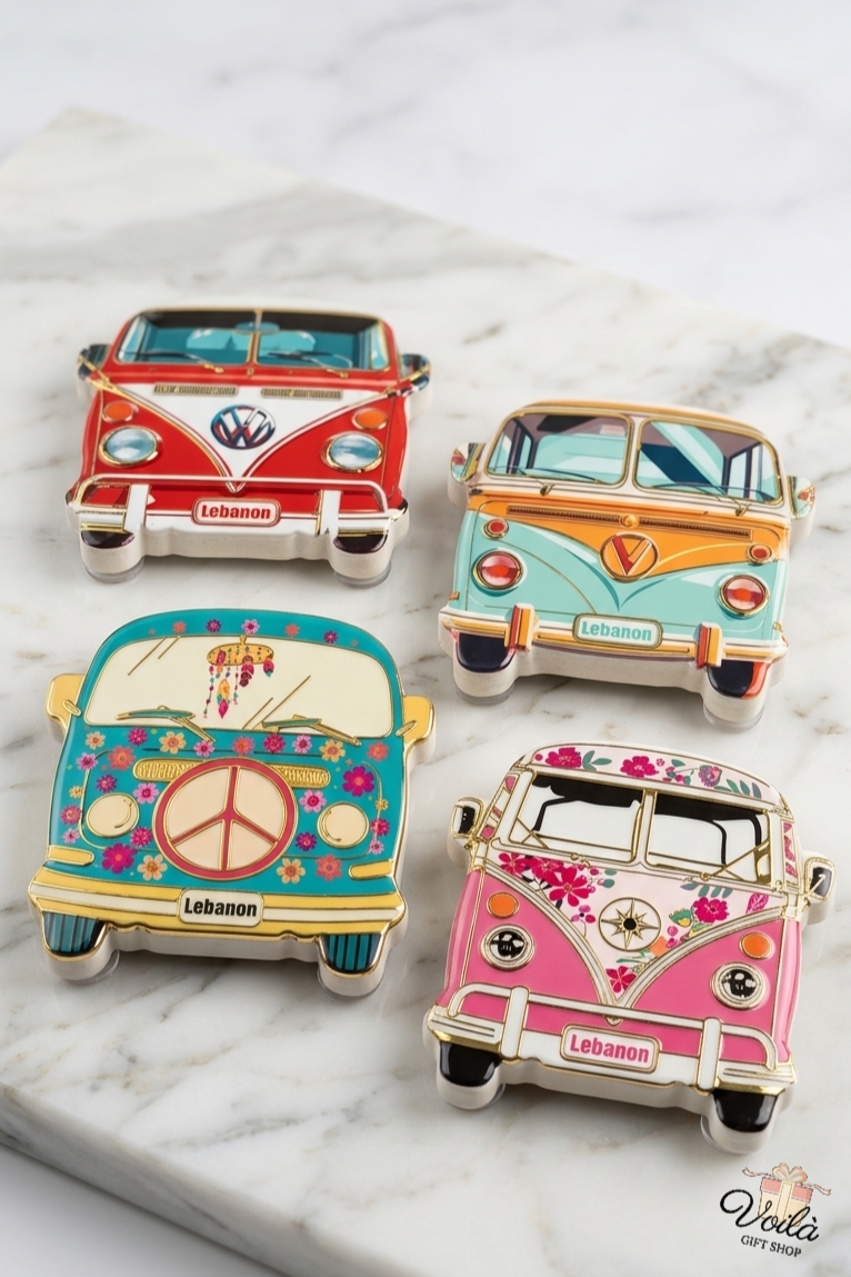 Set of four colorful vintage VW camper van magnets with Lebanon license plates on a marble surface.