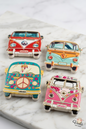 Set of four colorful vintage VW camper van magnets with Lebanon license plates on a marble surface.